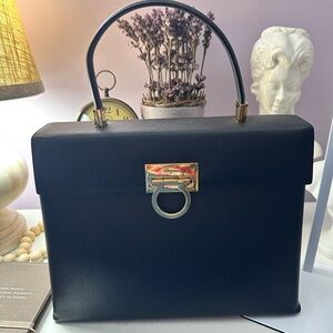 Salvatore Ferragamo Black Satchel with Gold Accents